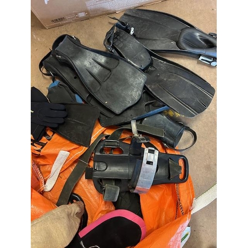 324 - Collection of Suba diving equipment to include SCUBA tanks/ cylinders, Dry Suits, Regulators, weight... 