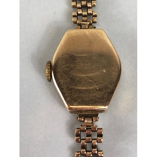 34 - 9ct gold watches, Ladies Rotary  dress bracelet watch with MOP dial winds and runs approximately 19c... 