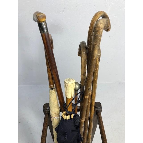 342 - Collection of Vintage walking sticks and umbrellas in a square oak stand with drip tray