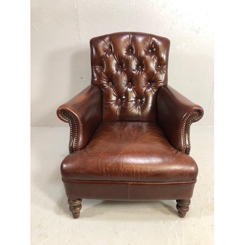 355 - Burgundy leather button back fireside chair with stud detailing and turned front legs