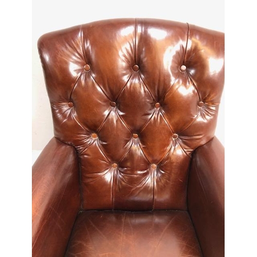 355 - Burgundy leather button back fireside chair with stud detailing and turned front legs