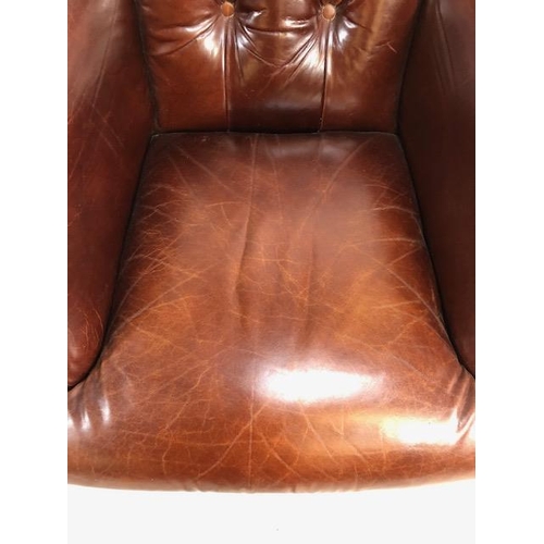 355 - Burgundy leather button back fireside chair with stud detailing and turned front legs