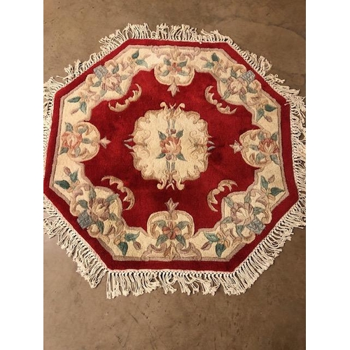 362 - Chinese wool rugs, Two rugs  of sculpted style with typical designs of flowers against a red  back g... 