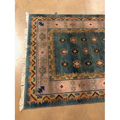 364 - Modern Rug  of oriental design, geometric patterns  on a two colour back ground approximately 230 x ... 