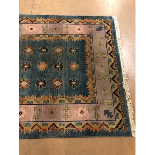 364 - Modern Rug  of oriental design, geometric patterns  on a two colour back ground approximately 230 x ... 