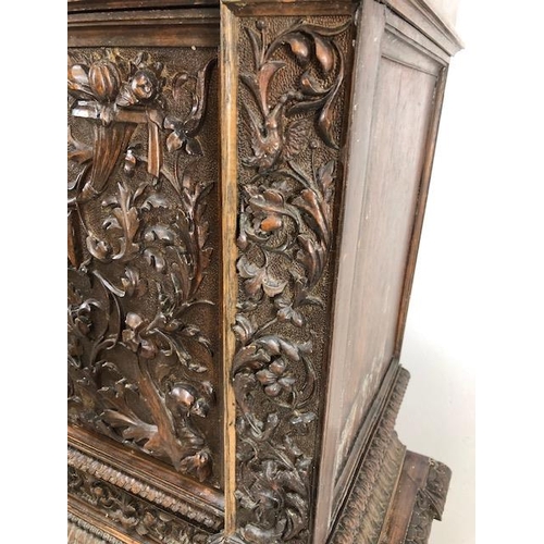 366 - Heavily carved square cupboard on stand, carved with inscription 