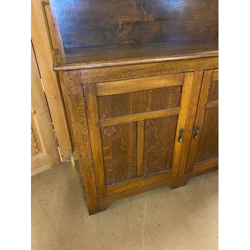 367 - Arts and Crafts oak dresser with shelves above and two cupboards under by maker Curtiss & Sons, appr... 