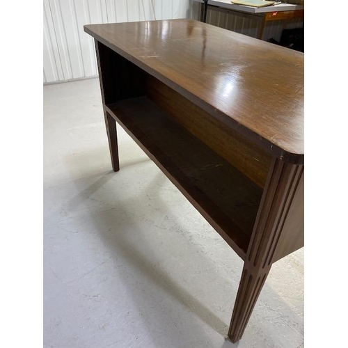 369 - Mahogany library table with open bookshelves to either long side, with tapering fluted legs, approx ... 