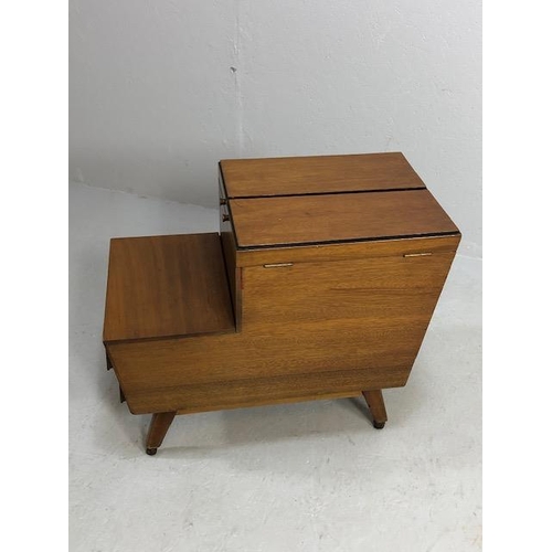 370 - Mid century style teak storage unit (sewing or crafts box) in teak with drawers and storage trays on... 