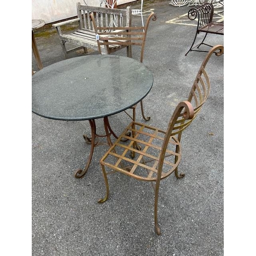 390 - Marble topped Bistro table on wrought Iron curved legs with two wrought iron chairs