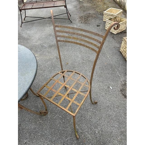 390 - Marble topped Bistro table on wrought Iron curved legs with two wrought iron chairs