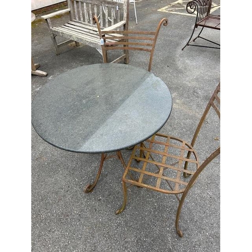 390 - Marble topped Bistro table on wrought Iron curved legs with two wrought iron chairs