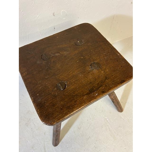 393 - Antique Furniture, provincial made Elm top  peg stool on 4  spoke shave legs approximately 40cm high