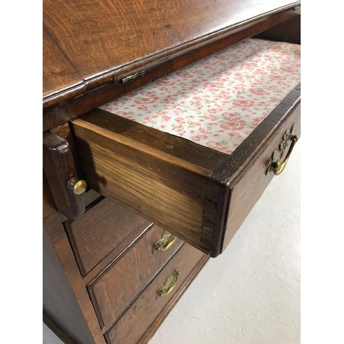 415 - Antique Furniture, late Georgian period oak bureau on bracket feet, run of four drawers with brass h... 