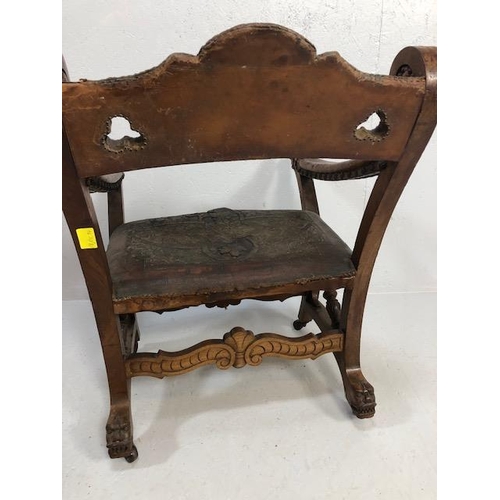 421 - Antique Furniture, 19th Century Spanish revival arm chair the frame with carved decoration of lions ... 