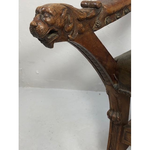 421 - Antique Furniture, 19th Century Spanish revival arm chair the frame with carved decoration of lions ... 