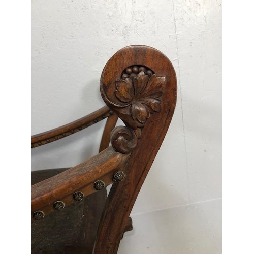 421 - Antique Furniture, 19th Century Spanish revival arm chair the frame with carved decoration of lions ... 