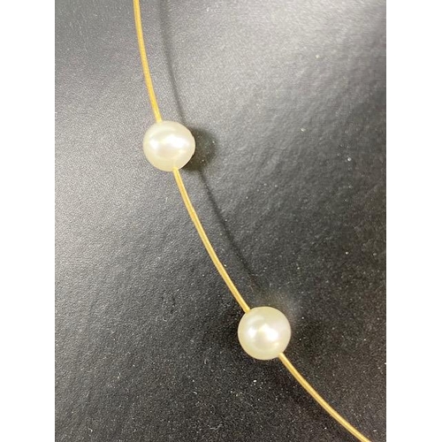 46 - 9ct gold wire and cultured pearl choker necklace of single strand design set with 15 pearls