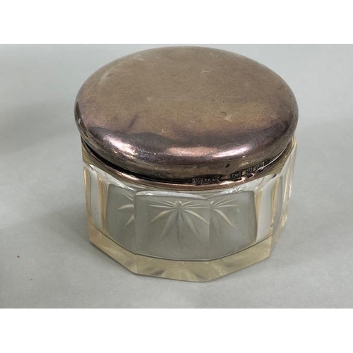 49 - Silver Hallmarked pin box, silver top glass vanity pot, two button hooks and powder pot, five items ... 