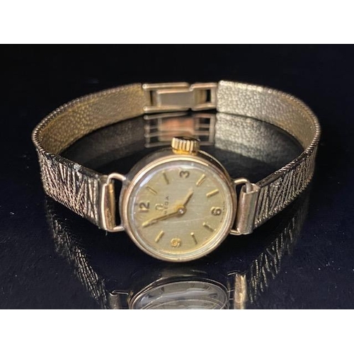 50 - 9ct gold vintage 1960s ladies OMEGA wrist watch on 9ct gold bark finish bracelet total length approx... 