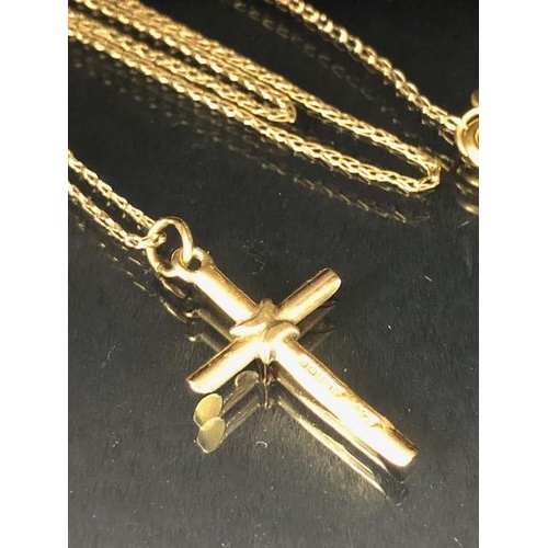 56 - Hallmarked 375 9ct Gold cross on fine 9ct Gold chain (A?F) total weight approx 3g