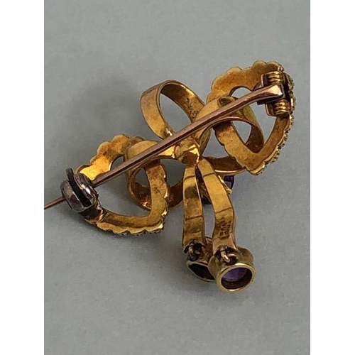 59 - 15ct yellow gold Victorian sweet heart brooch of 2 joined hearts set with seed peals and amethysts a... 