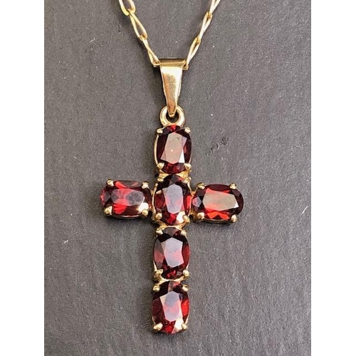 6 - 9ct Gold chain with a 9ct Gold pendant cross set with garnets (total weight approx 6.5g