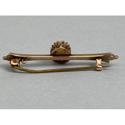 61 - Unmarked antique gold bar brooch set with a pear shaped opal approximately 5 x 10mm, total weight ap... 