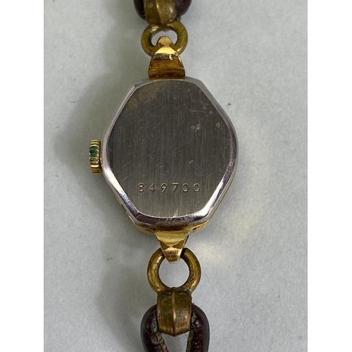 63 - 9ct gold cased ladies dress watch on a RG bracelet, winds and runs, along with a vintage Rotary ladi... 