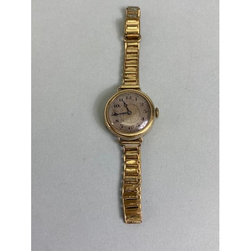 63 - 9ct gold cased ladies dress watch on a RG bracelet, winds and runs, along with a vintage Rotary ladi... 