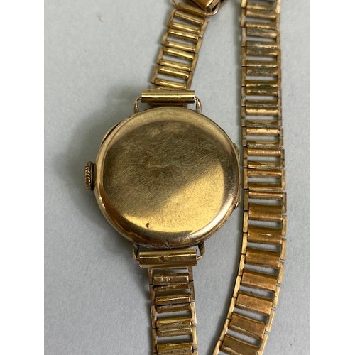 63 - 9ct gold cased ladies dress watch on a RG bracelet, winds and runs, along with a vintage Rotary ladi... 