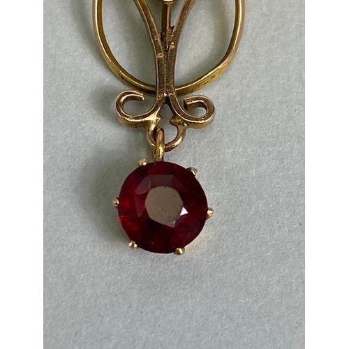 66 - Antique jewellery, Art Nouveau unmarked rose gold metal pendant set with two garnets, approximately ... 