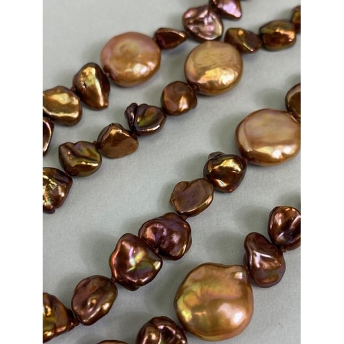 84 - Pearls, a string of bronze dyed baroque pearls with 14kt clasp approximately 36in