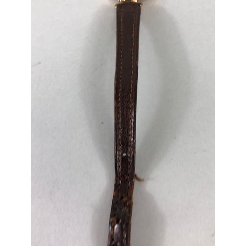 9 - 9ct Gold Ladies early 20th century round wrist watch on leather strap approximately 14.86g complete ... 