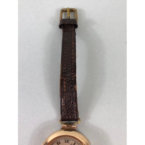 9 - 9ct Gold Ladies early 20th century round wrist watch on leather strap approximately 14.86g complete ... 