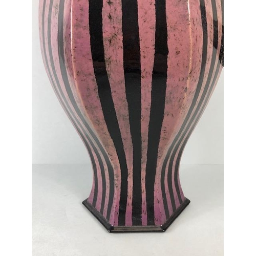 94 - Ross Emerson Art Ceramics, Oversized lilac and black stripped beak jug monogram to base approximatel... 