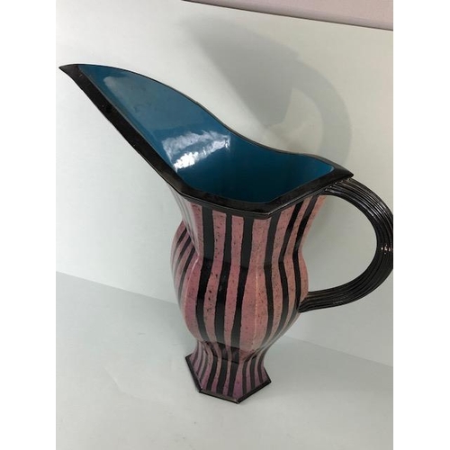 94 - Ross Emerson Art Ceramics, Oversized lilac and black stripped beak jug monogram to base approximatel... 