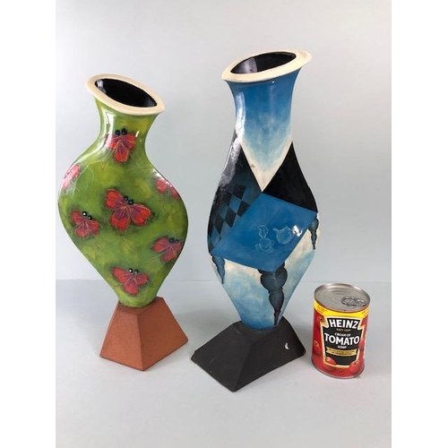 98 - Ross Emerson Art Ceramics, Two flat bodied vases, one with a surrealist table scene in blue tones ap... 