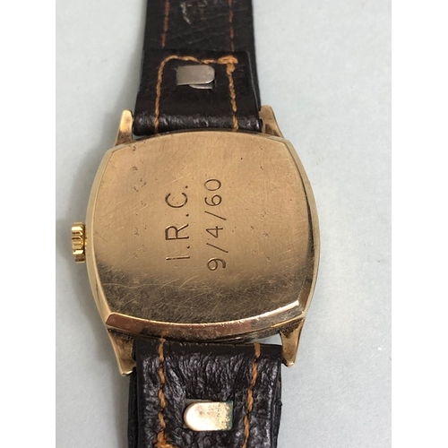 18a - 9ct Gold watch by RECORD square face with subsidiary dial at 6pm winds runs and sets on leather stra... 