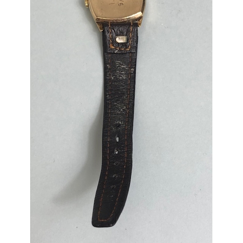 18a - 9ct Gold watch by RECORD square face with subsidiary dial at 6pm winds runs and sets on leather stra... 