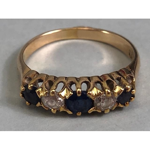 10 - 15ct marked yellow gold ring set with 3 sapphires and 2 diamonds, approximately size K  and 2.7g