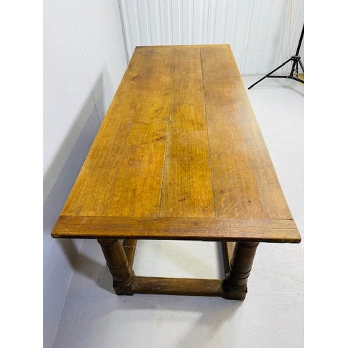 102 - Oak Antique four planked refectory table with bread board ends on turned legs with four stretchers a... 