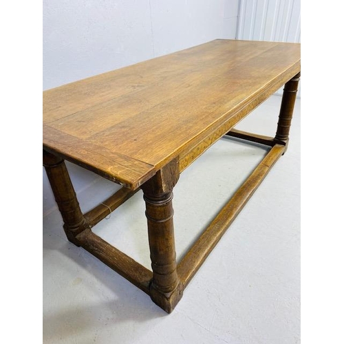 102 - Oak Antique four planked refectory table with bread board ends on turned legs with four stretchers a... 