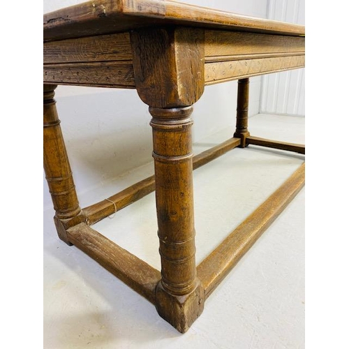 102 - Oak Antique four planked refectory table with bread board ends on turned legs with four stretchers a... 