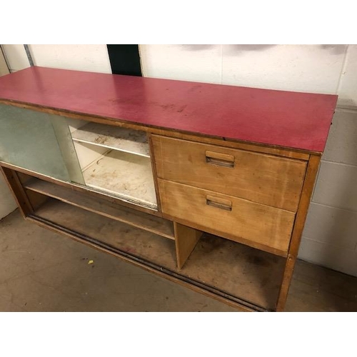 104 - Mid century Kitchen unit with two drawers and glass doors with pink/red top approx 154cm wide