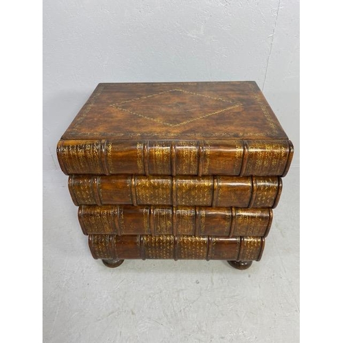 106 - Chest of four drawers of faux oversized books, wooden construction with gold inlay detailing on bun ... 