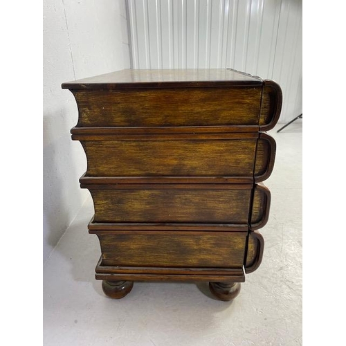 106 - Chest of four drawers of faux oversized books, wooden construction with gold inlay detailing on bun ... 