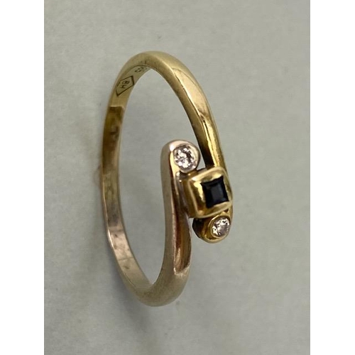 11 - 14ct Gold cross over ring set with diamonds size approx Q and 2.3g