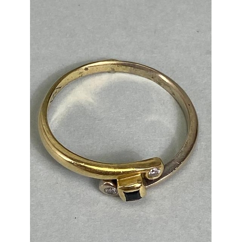 11 - 14ct Gold cross over ring set with diamonds size approx Q and 2.3g