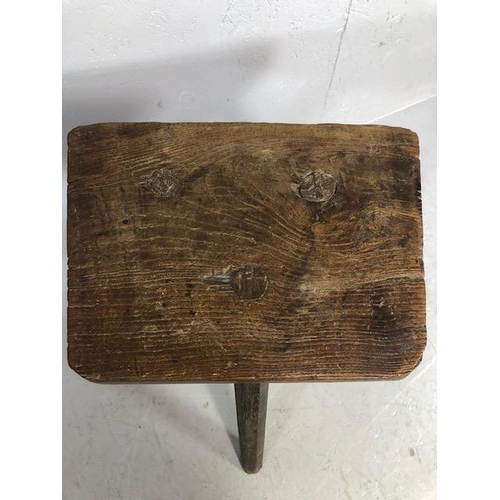 111 - Rustic oak jointed three legged stool of tall proportions approx 58cm tall